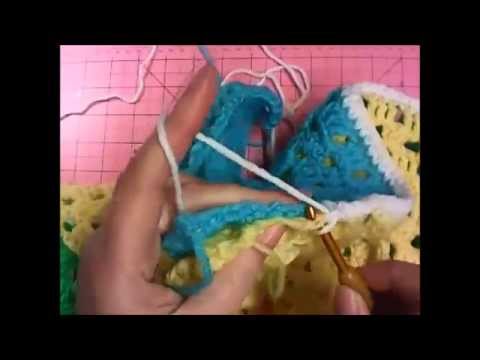 Joining Blocks with Single Crochet — still from the Poochie Baby video tutorial